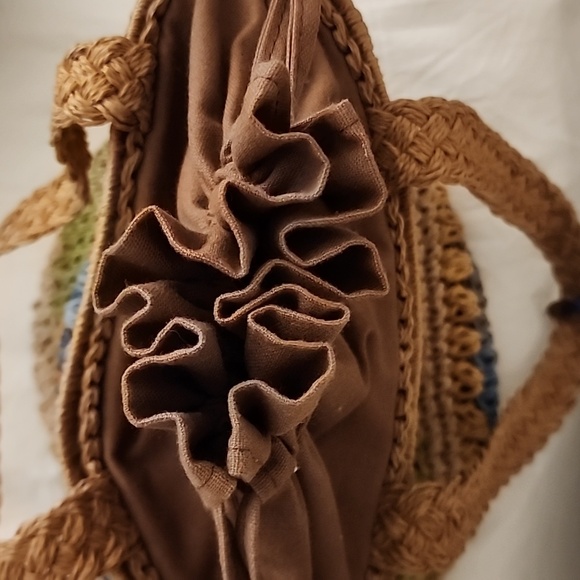 Multi coloured straw bag with drawstring top. inside zip privacy pocket - Picture 9 of 10